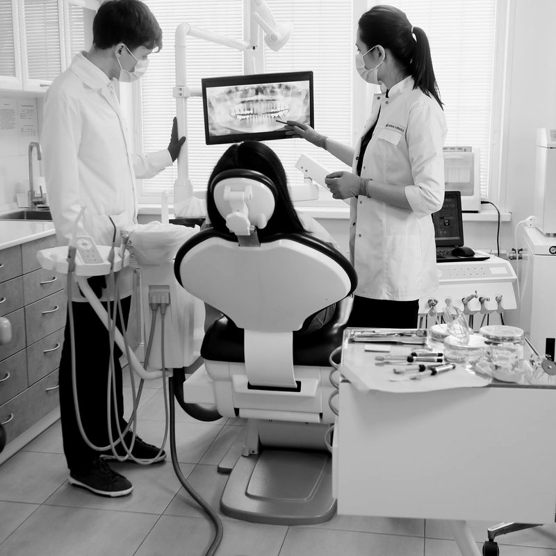Dentists reviewing a scan